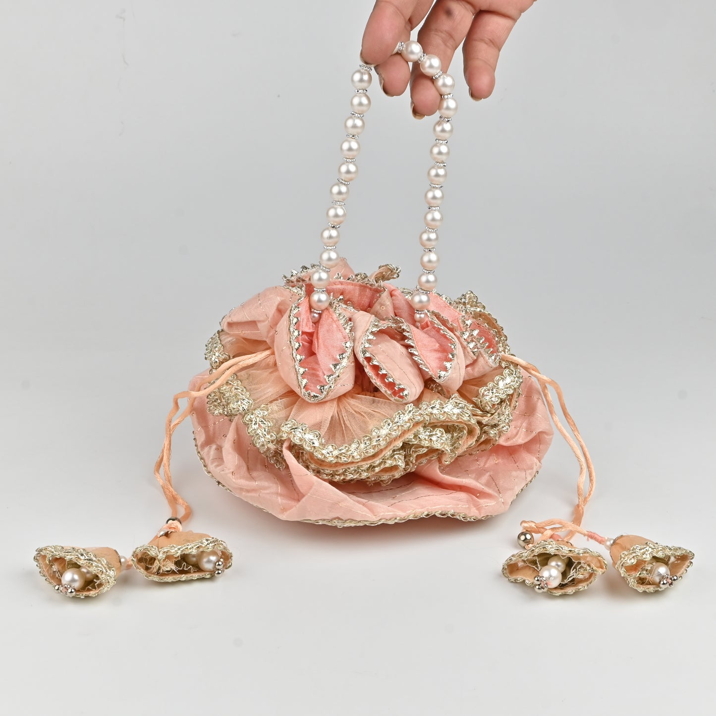 Banaavat Essence Handi-Inspired Silk Potli – Pearl Handle & Handcrafted Tassel